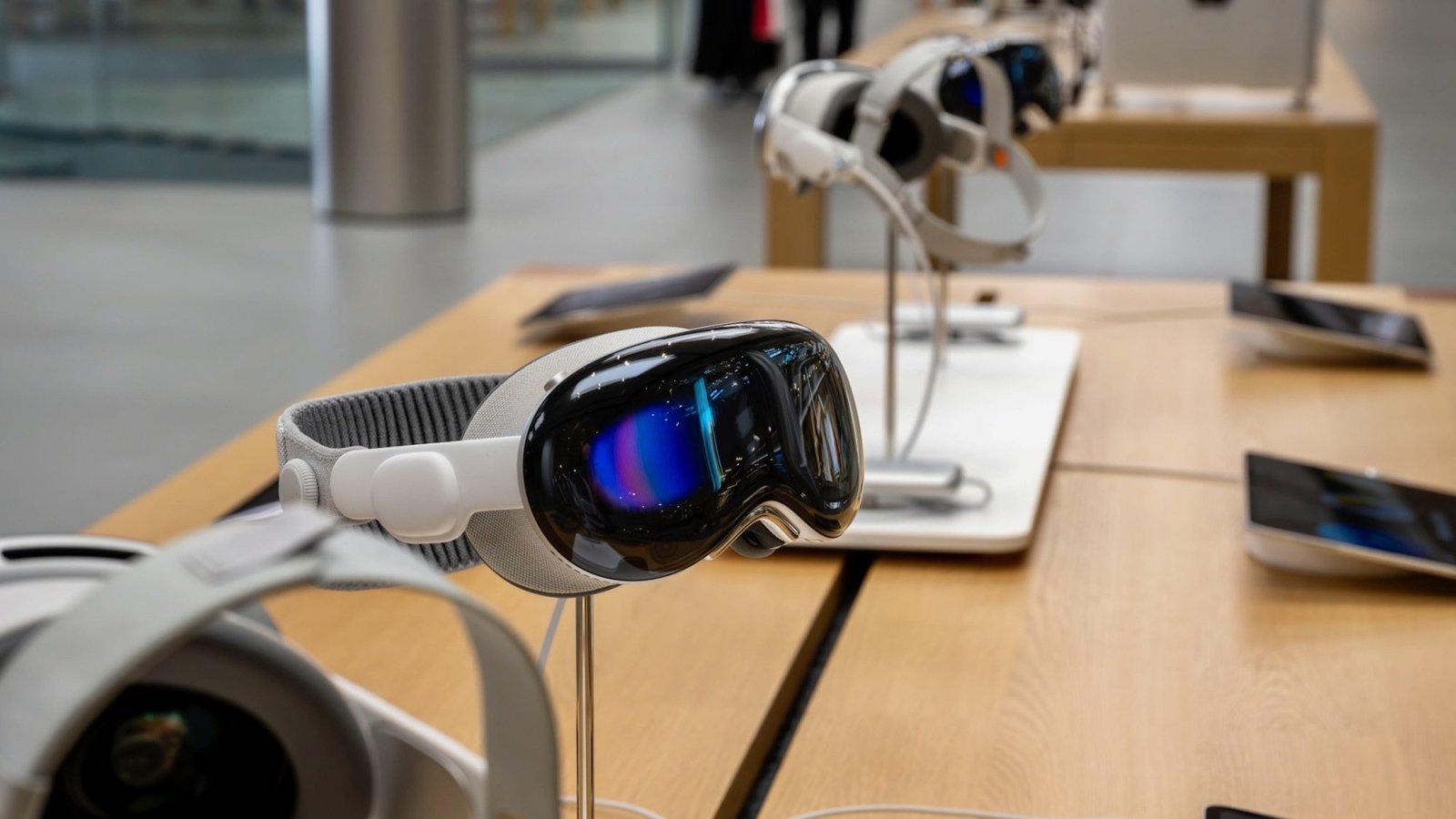 apple vision pro headsets on display in apple store